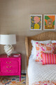 A burst of Hot Pink cushions against the soft backdrop of Raffia Rose wallpaper, creating a trend-forward, feminine bedroom that’s as bold as it is inviting. A vibrant space where texture and colour come alive.